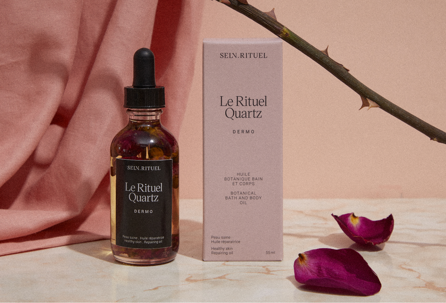 Le Rétuel Quartz skincare product with bottle and box on a neutral background